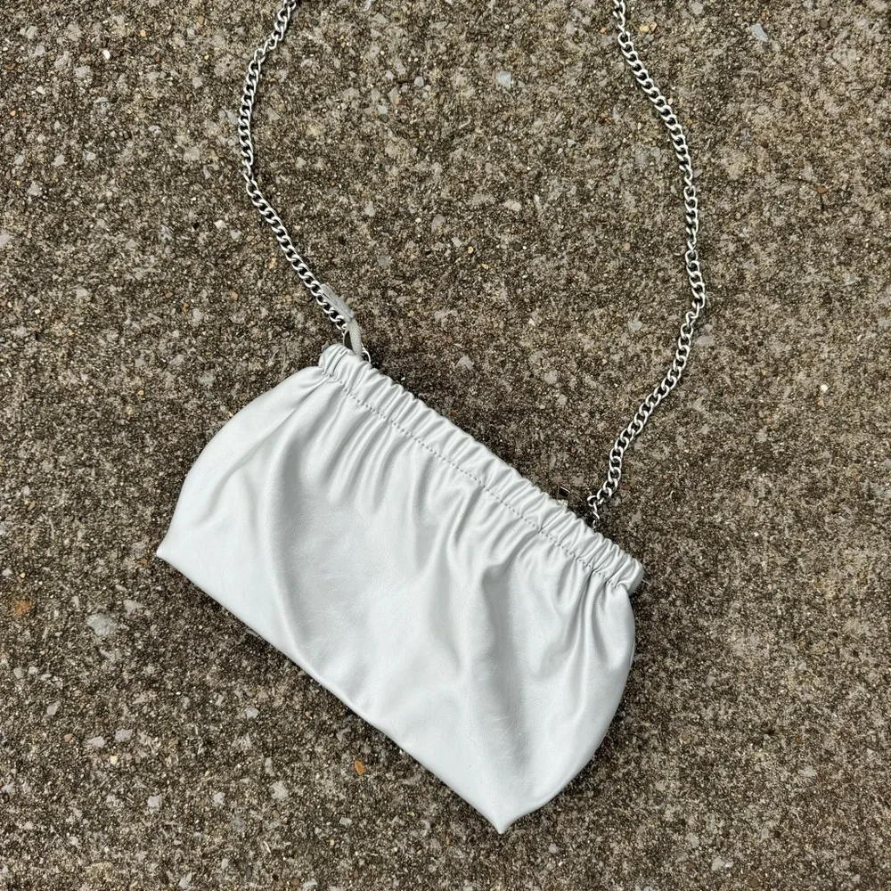 Silver ahdorned crossbody bag